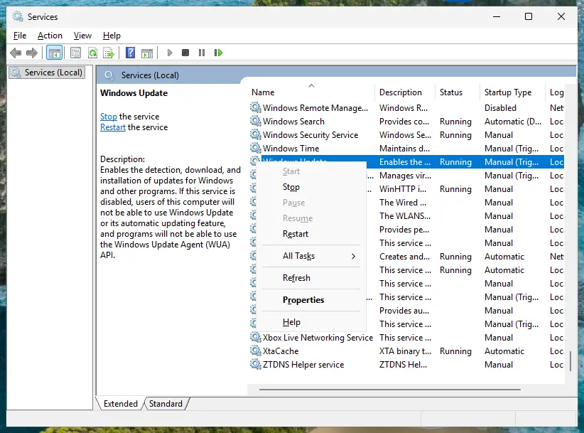 Right-click menu of the Windows Update service with Start, Stop, Restart and Properties